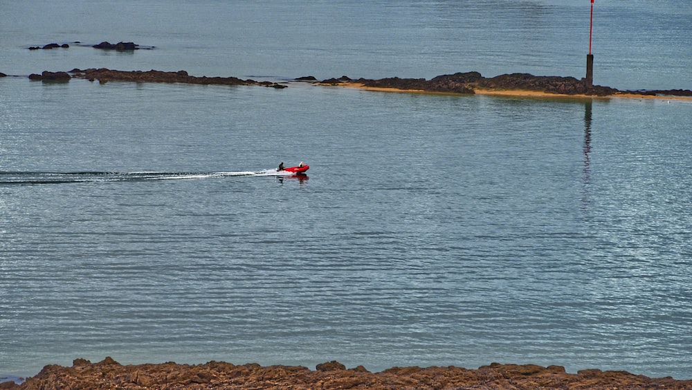 person surfing on sea during daytime