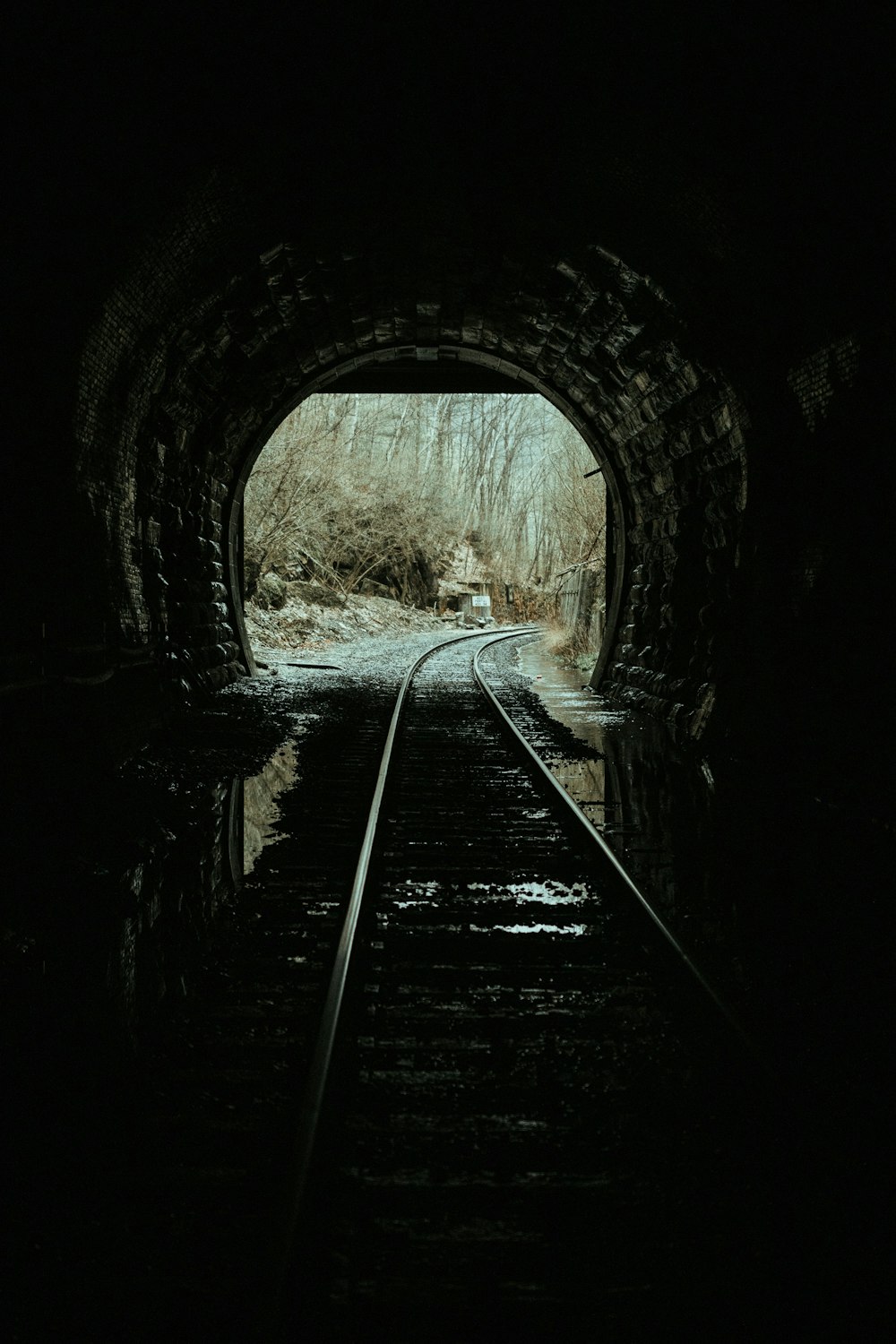 grayscale photo of train rail