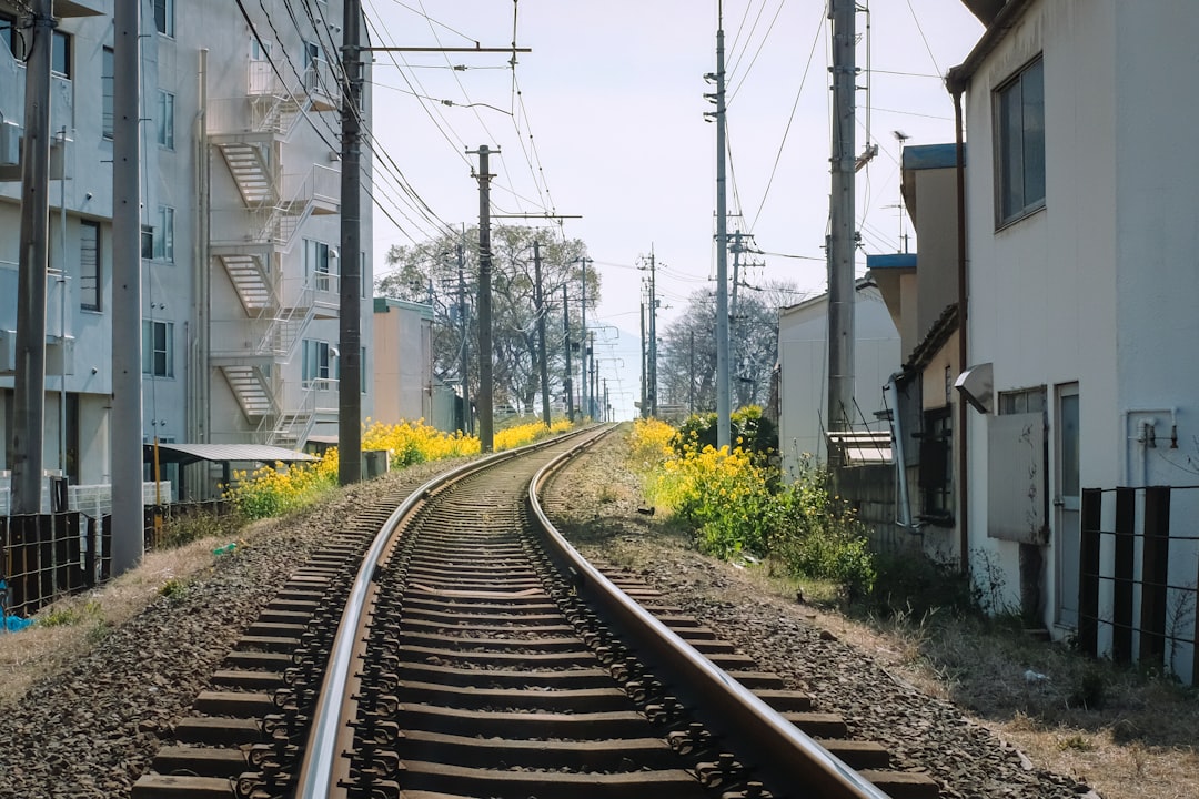 train rail near building during daytime