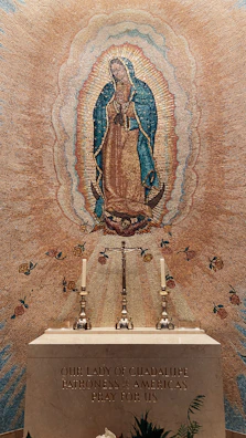 A vintage illustration of Saint Juan Diego holding the tilma with the Virgin of Guadalupe's image.