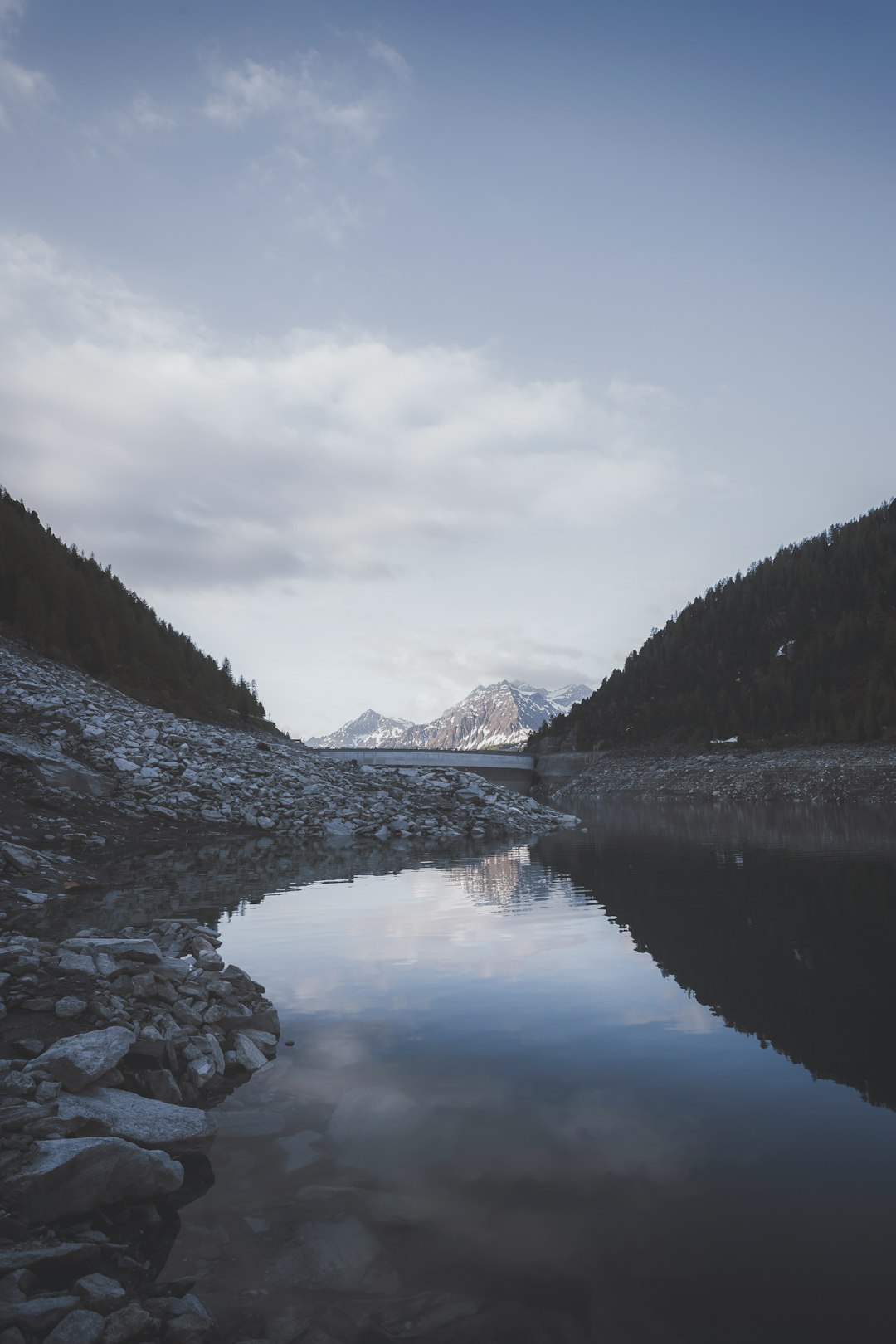 lake in the middle of mountains