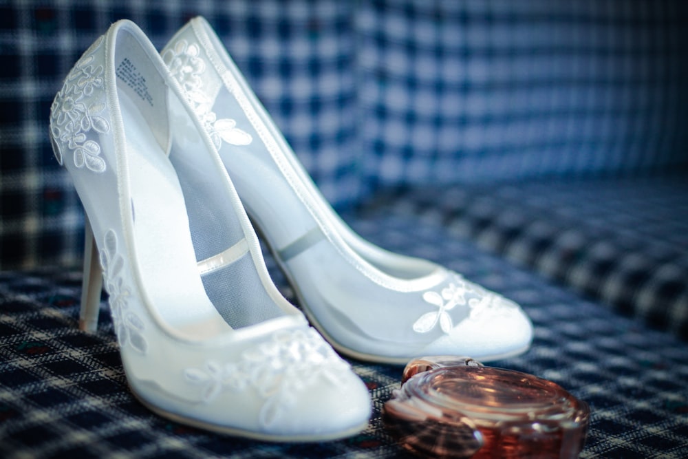 white leather peep toe pumps