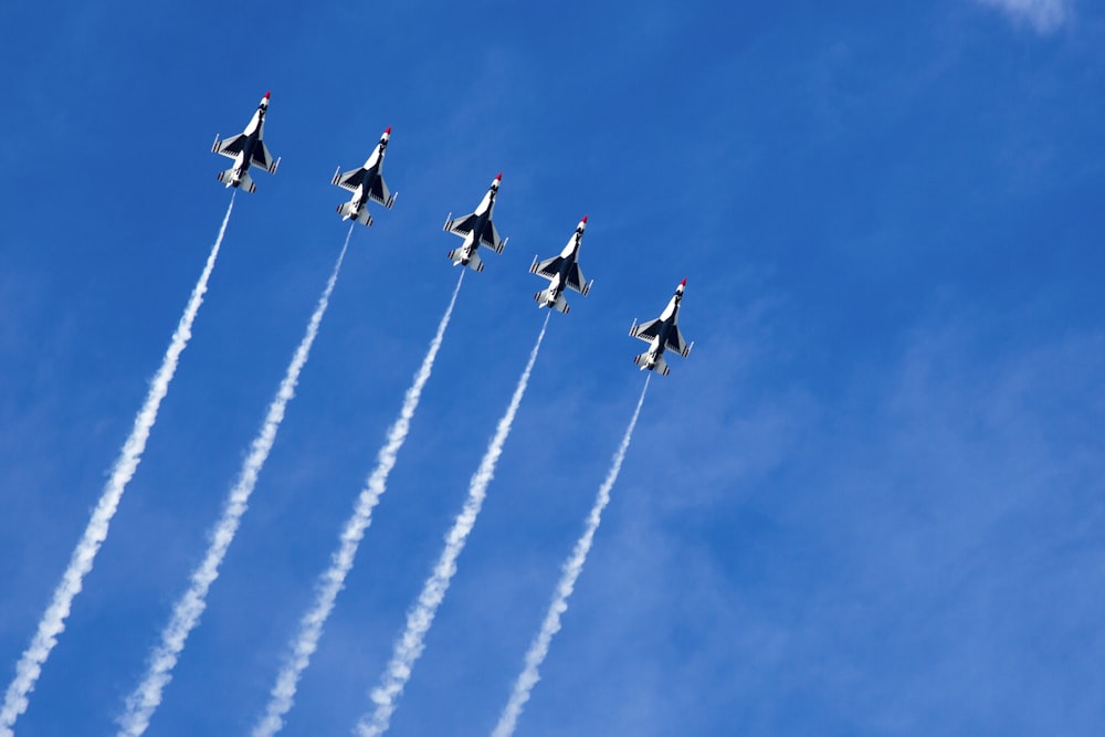 four fighter planes in mid air