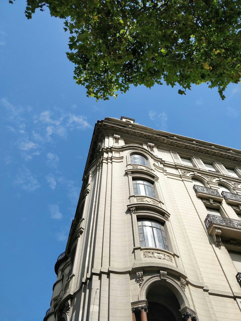 white concrete building under blue sky during daytime