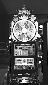 grayscale photo of analog watch