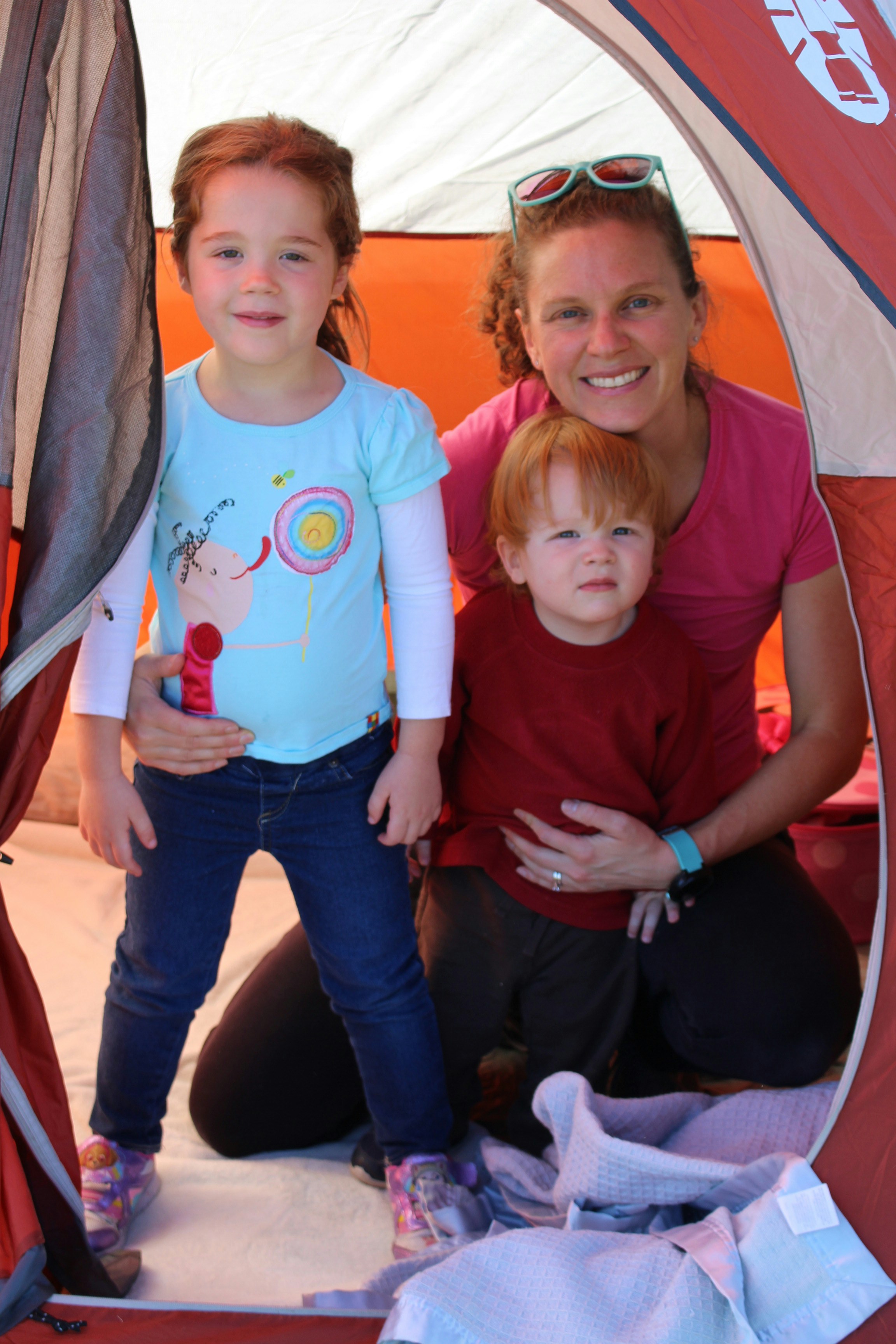 Family camping in tent