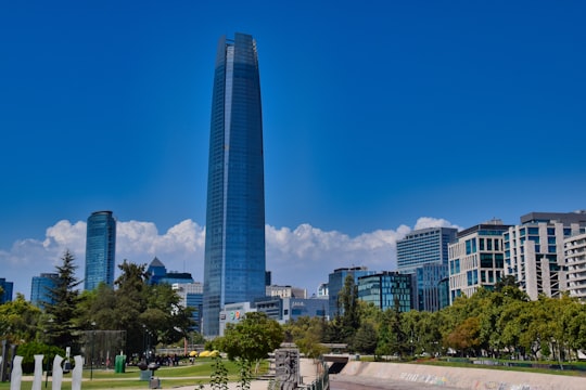 city skyline under blue sky during daytime in Sky Costanera Chile