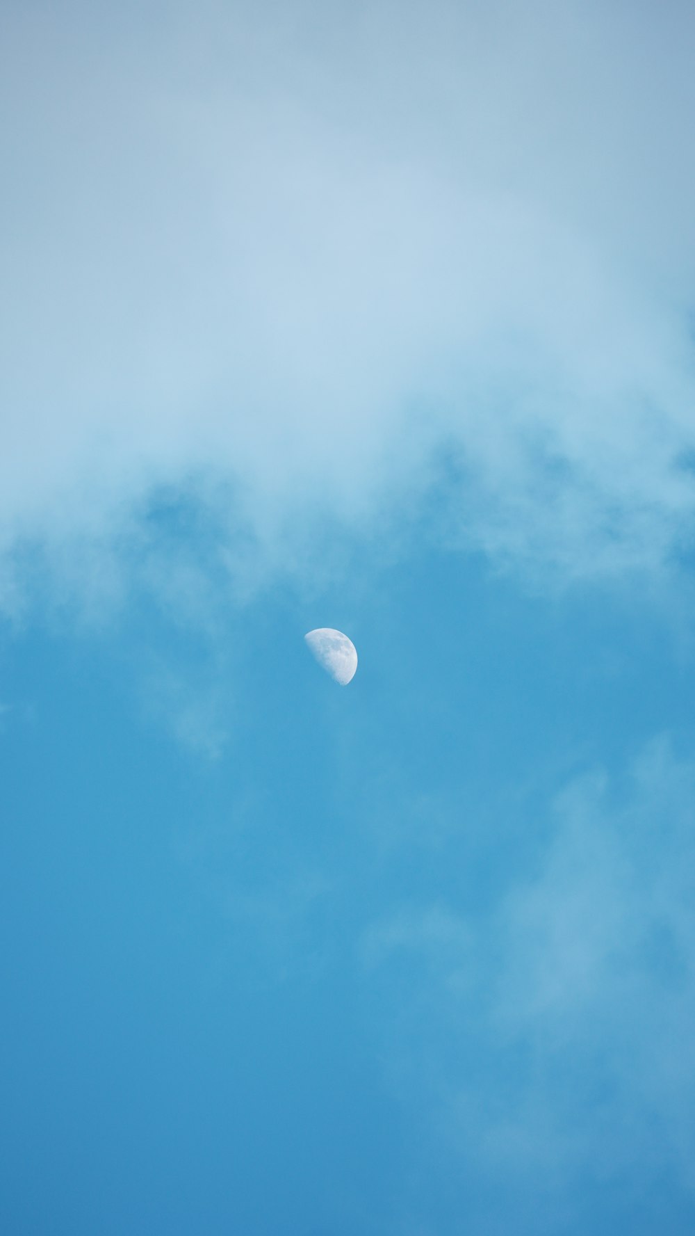 full moon in blue sky