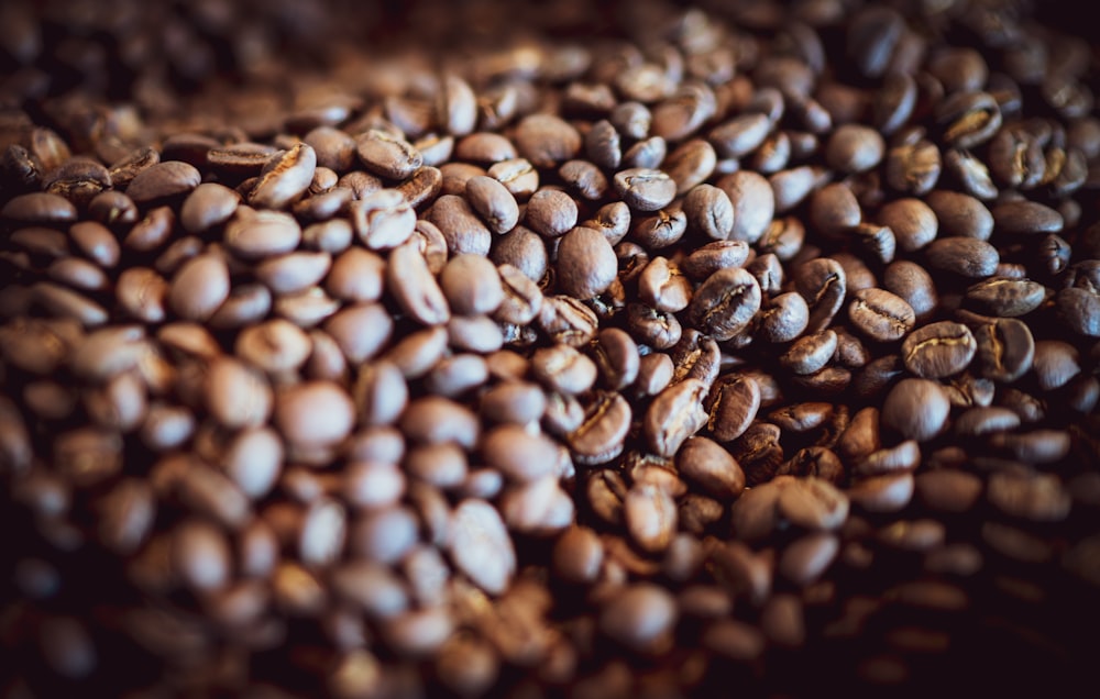 brown coffee beans on brown wooden table