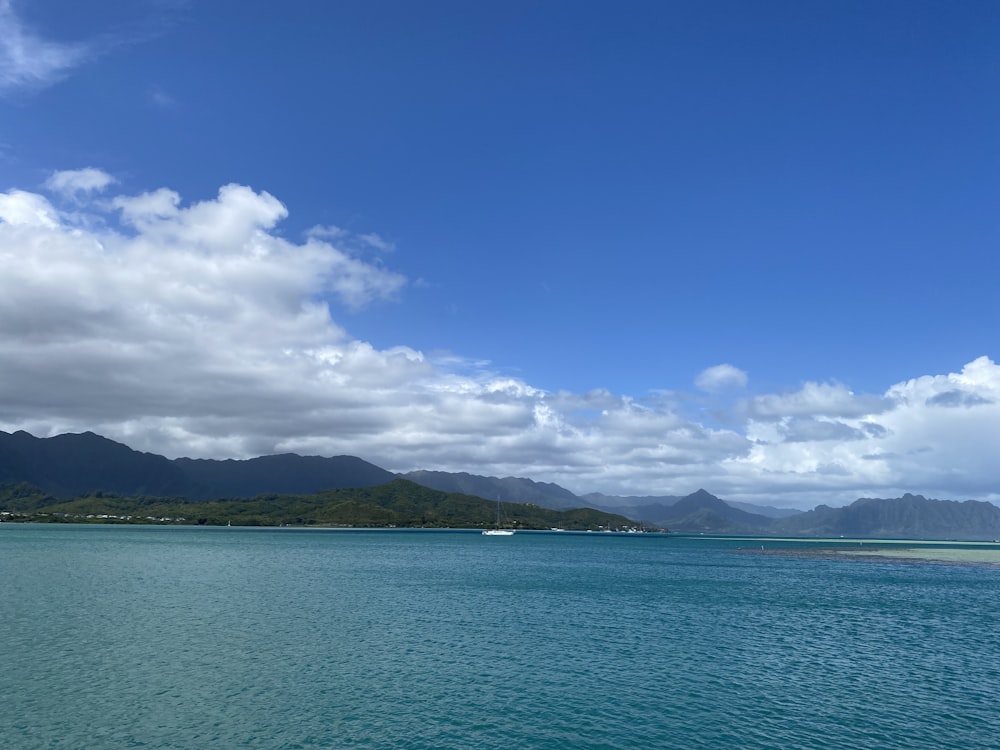 blue sea under blue sky during daytime