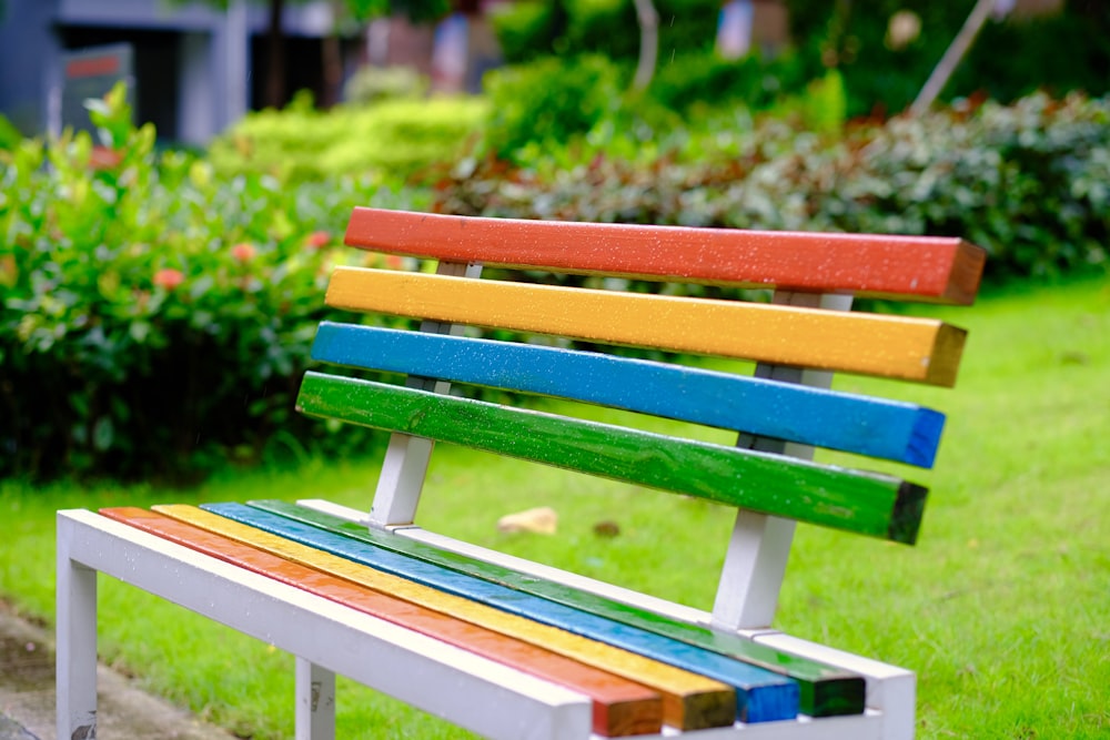 red blue and yellow wooden bench