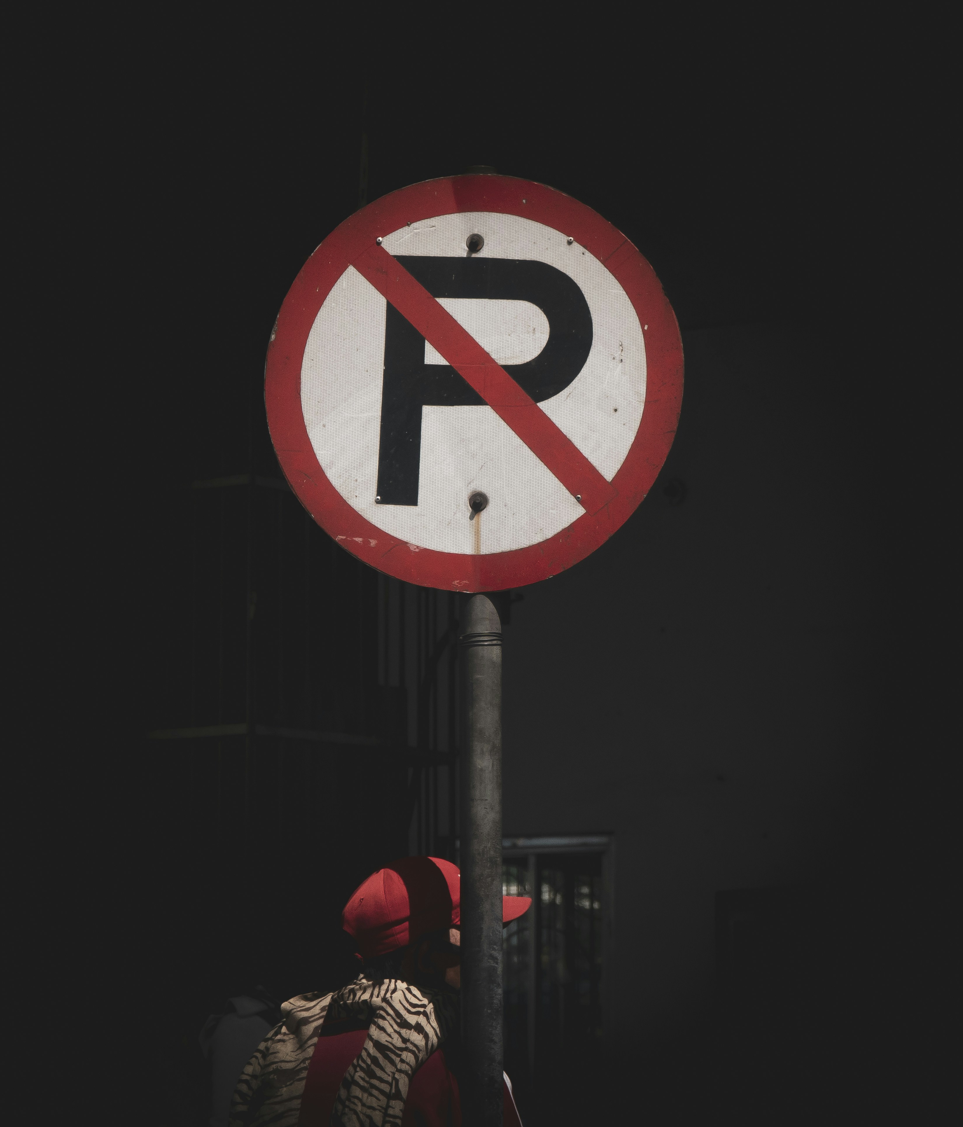 red and white no smoking sign