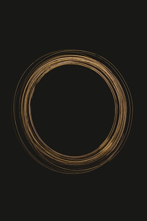Abstract image of interconnected golden lines symbolizing harmony and connection