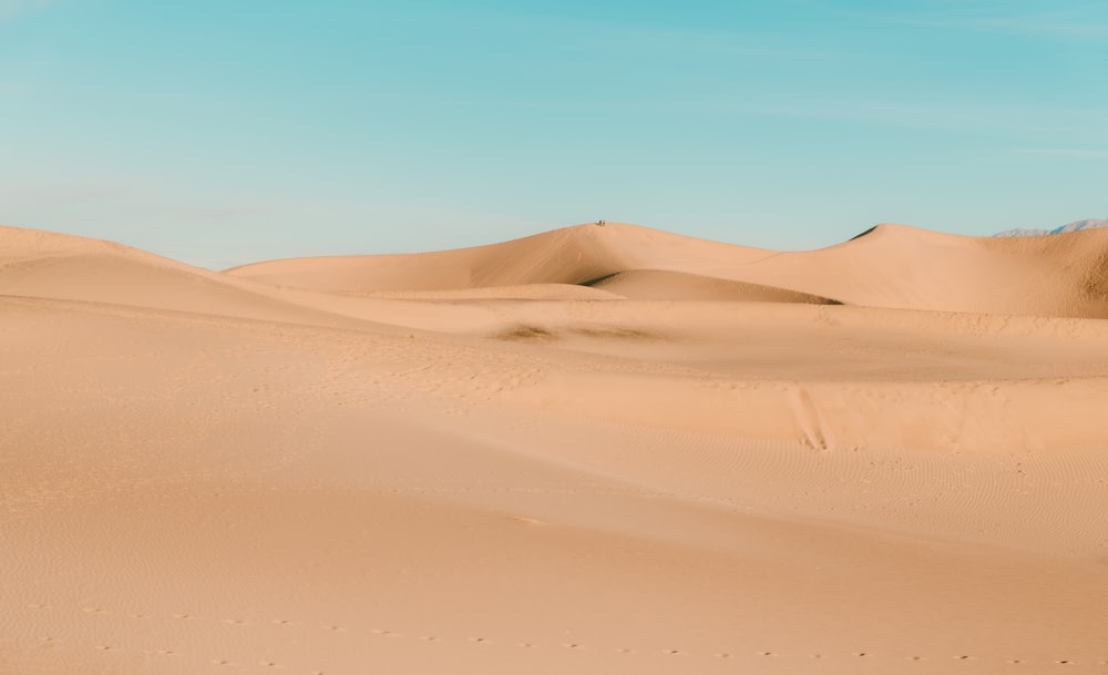 desert under blue sky during daytime