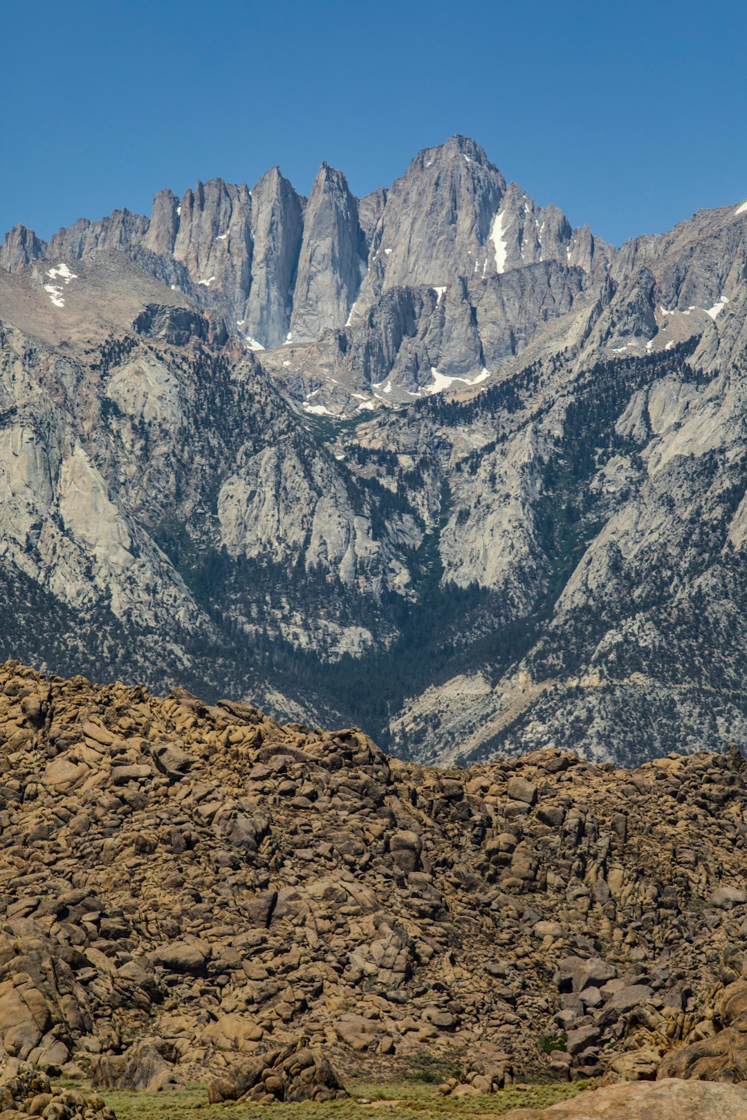 brown and gray rocky mountain under blue sky during daytime