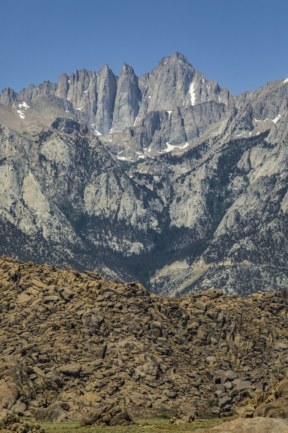 brown and gray rocky mountain under blue sky during daytime