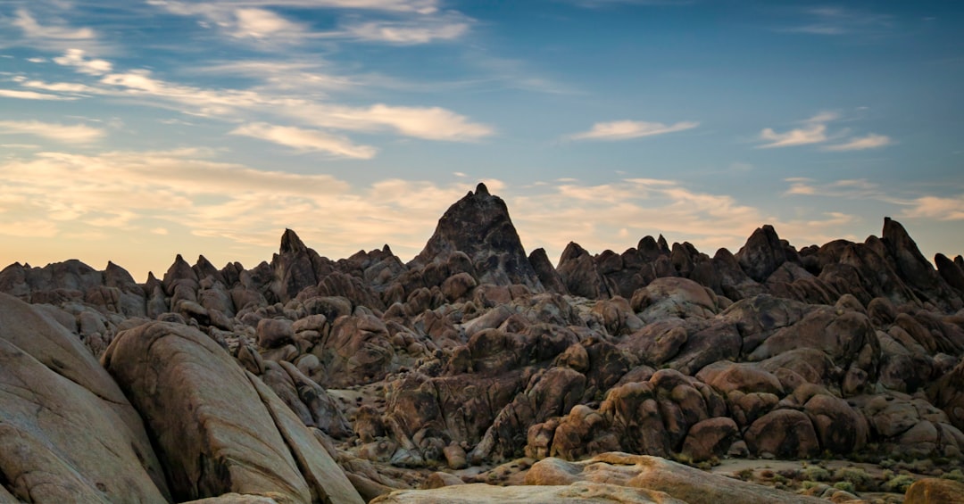 brown rock formation under blue sky during daytime