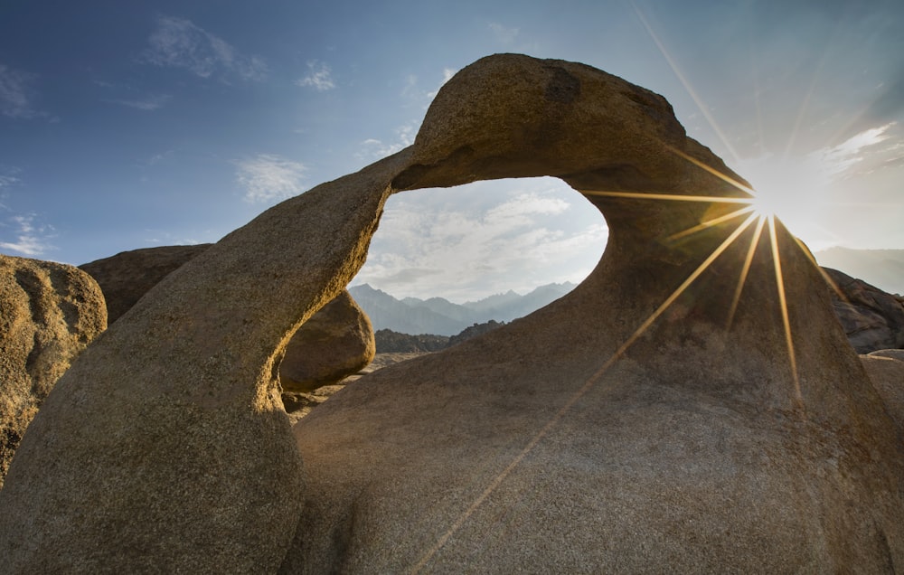 brown rock formation under blue sky during daytime