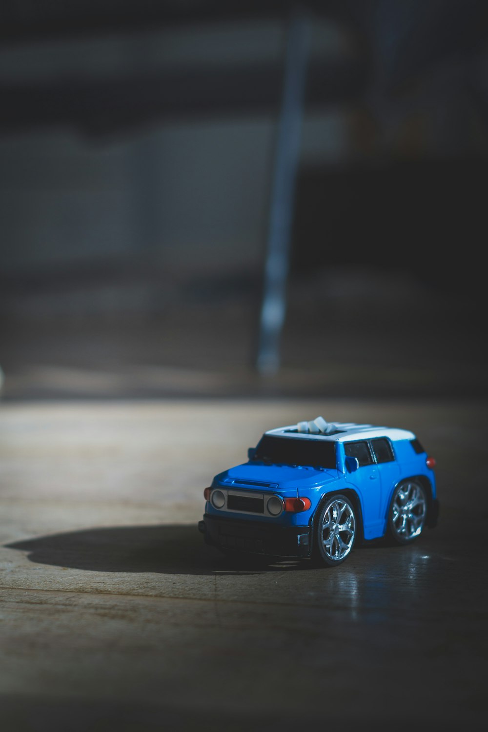 blue chevrolet camaro on road during daytime