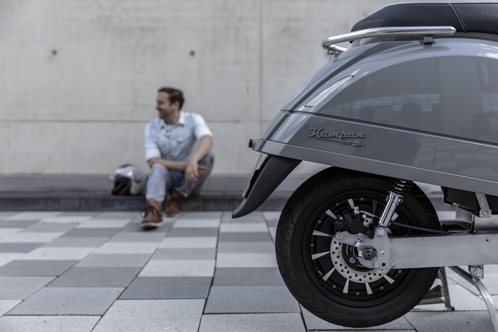 black and gray motorcycle on gray concrete road during daytime