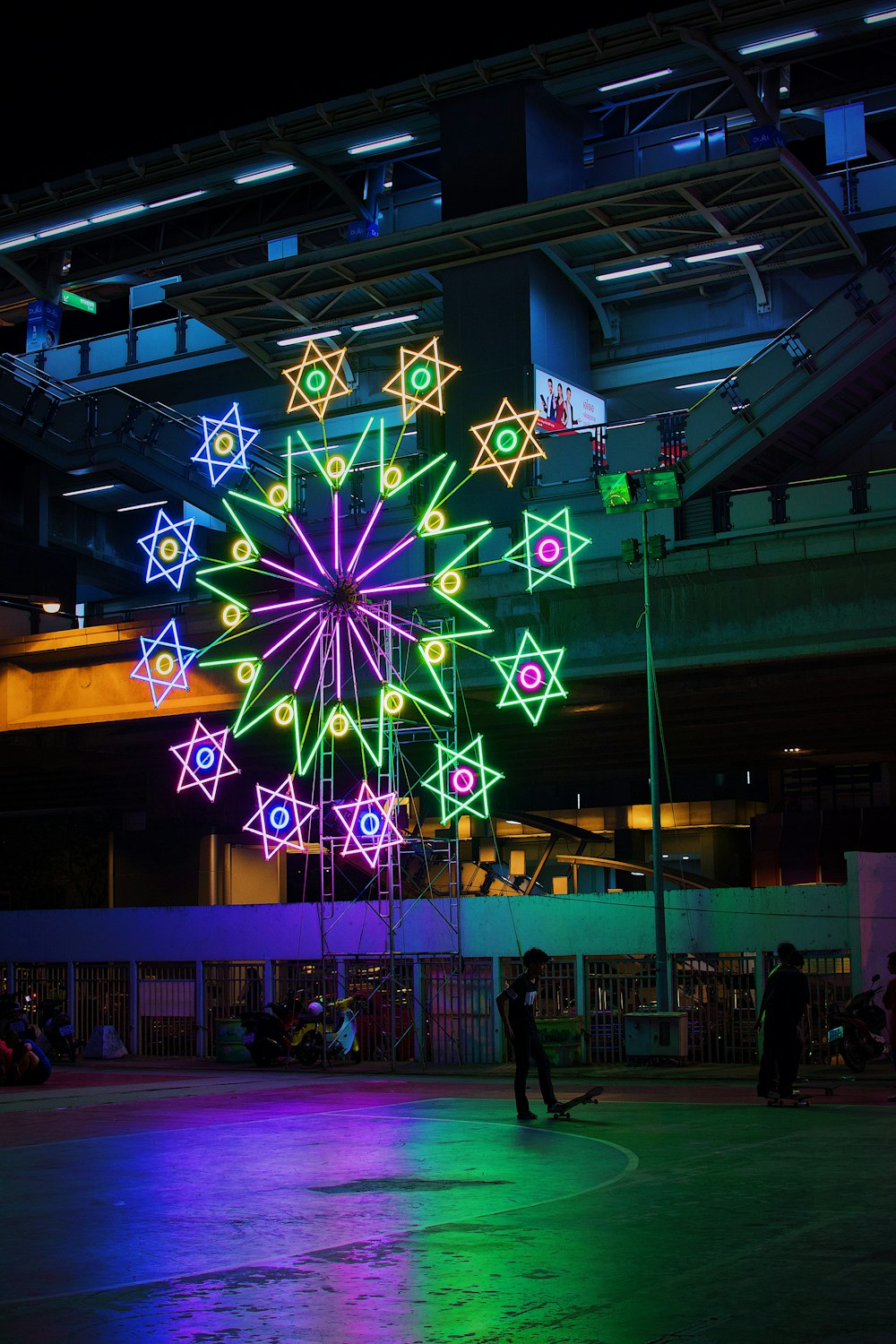 green and purple lighted ferris wheel