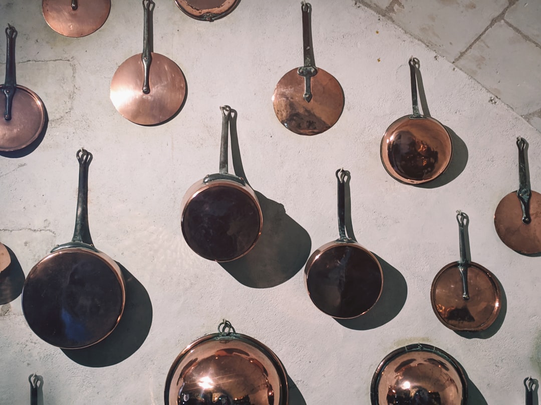 brown and silver round wall decor,