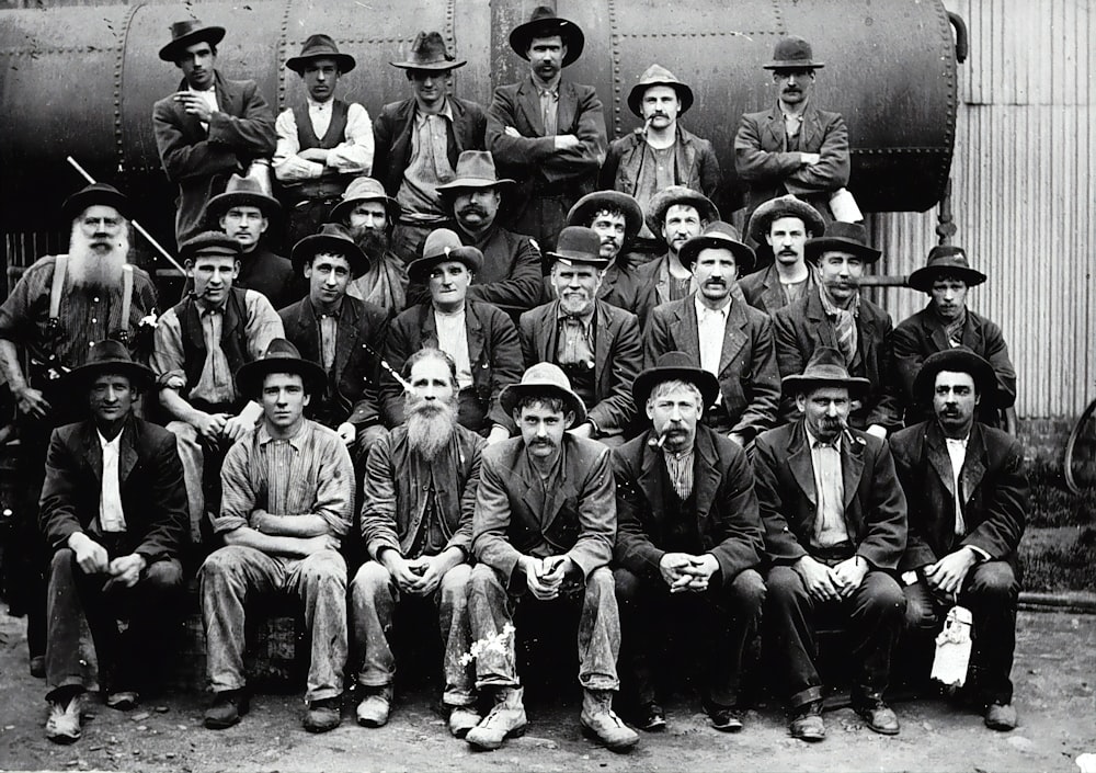 grayscale photo of group of men