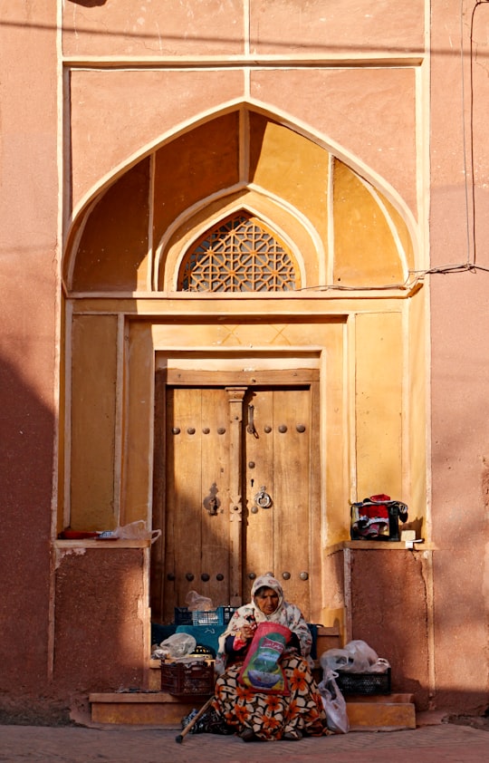 brown wooden door with padlock in Kashan Iran