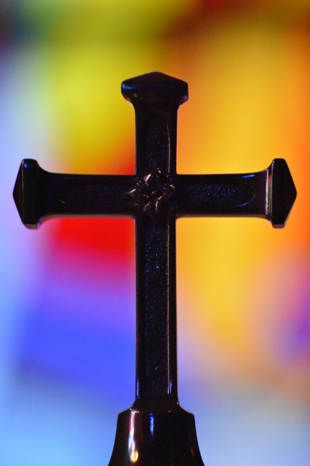 black cross with orange background