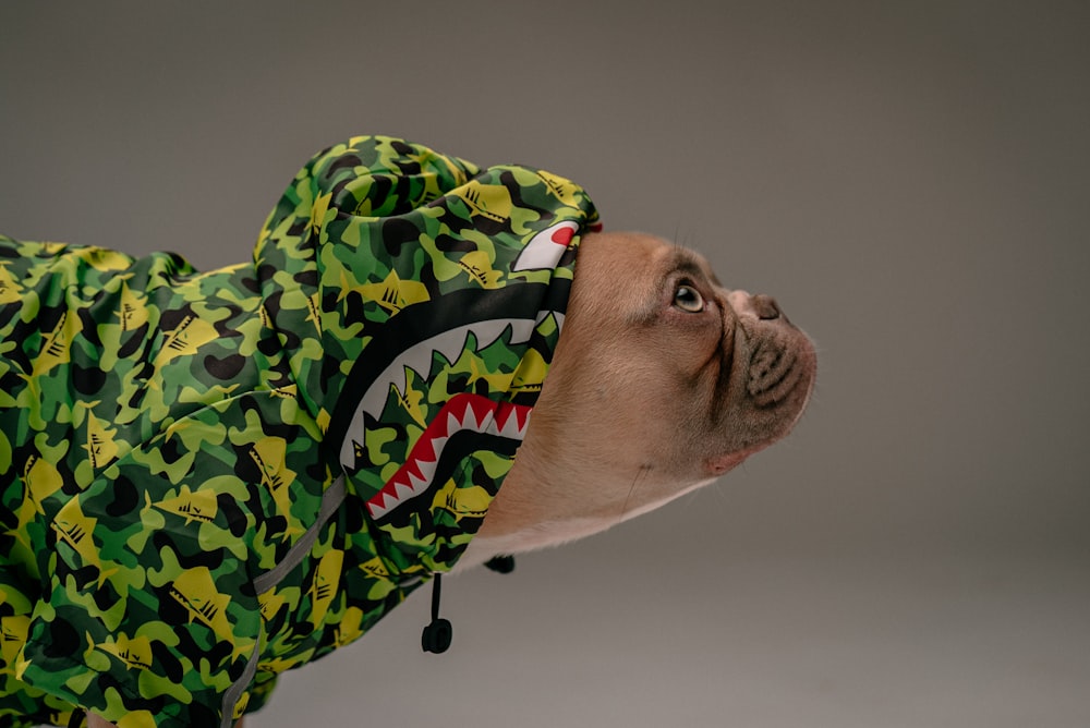 man in white green and black floral scarf