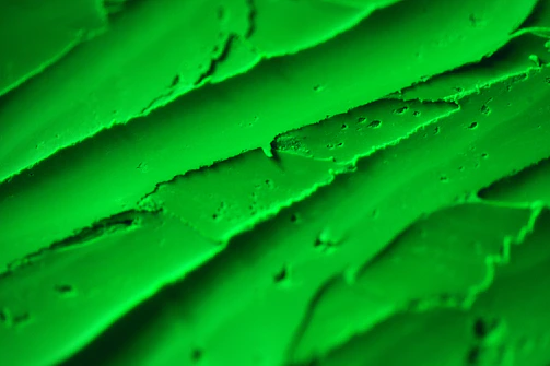 Close-up of matte forest green PVC frame detail highlighting texture and finish.