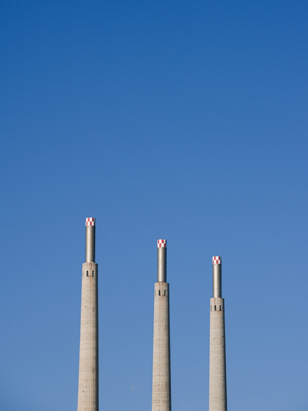 gray concrete tower under blue sky during daytime