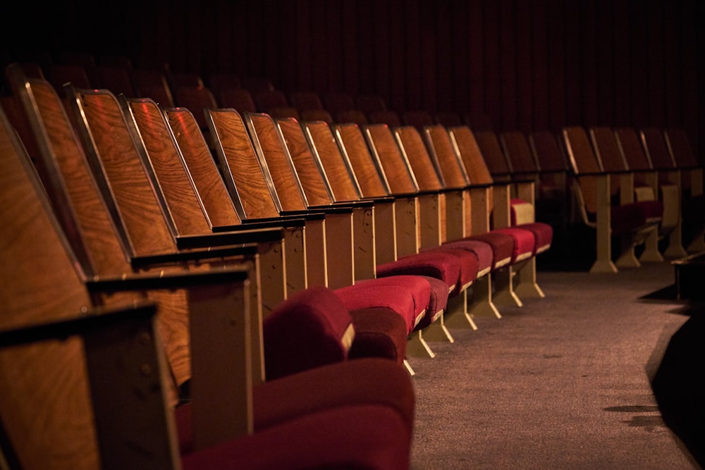 brown wooden chairs on gray carpet