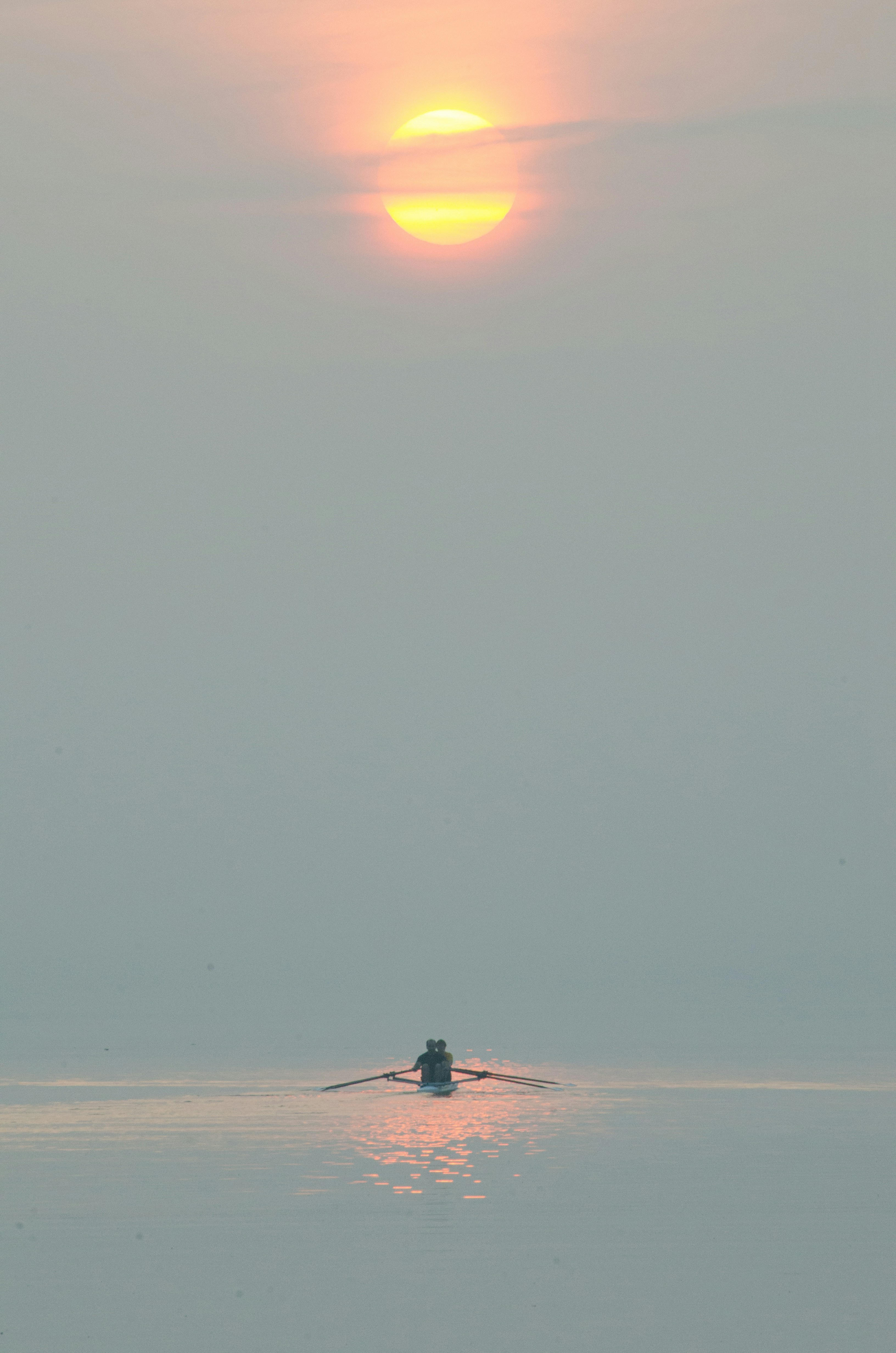 person in black shirt standing on beach during daytime