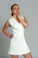 woman in white sleeveless dress