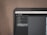 A computer monitor displays Adobe Lightroom Classic with a visible navigation panel on the left side. The interface includes options like Navigator, Presets, Snapshots, History, and Collections. A dark theme is applied, with a close-up focus on the top part of the screen, emphasizing the menu options and the title bar.