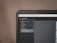A computer monitor displays Adobe Lightroom Classic with a visible navigation panel on the left side. The interface includes options like Navigator, Presets, Snapshots, History, and Collections. A dark theme is applied, with a close-up focus on the top part of the screen, emphasizing the menu options and the title bar.
