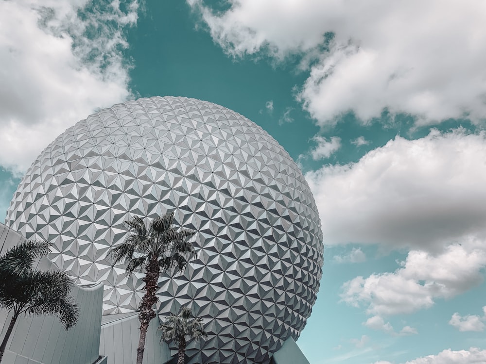 white and black round ball under blue sky