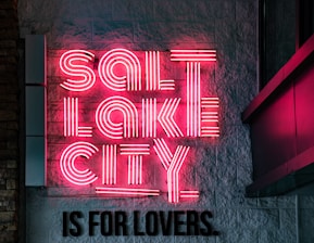 red and white love neon light signage