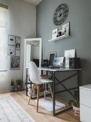 Quiet workspace with minimalist furniture and soft gray accents