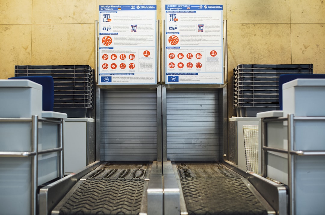 gray metal roll up door, Airport check in