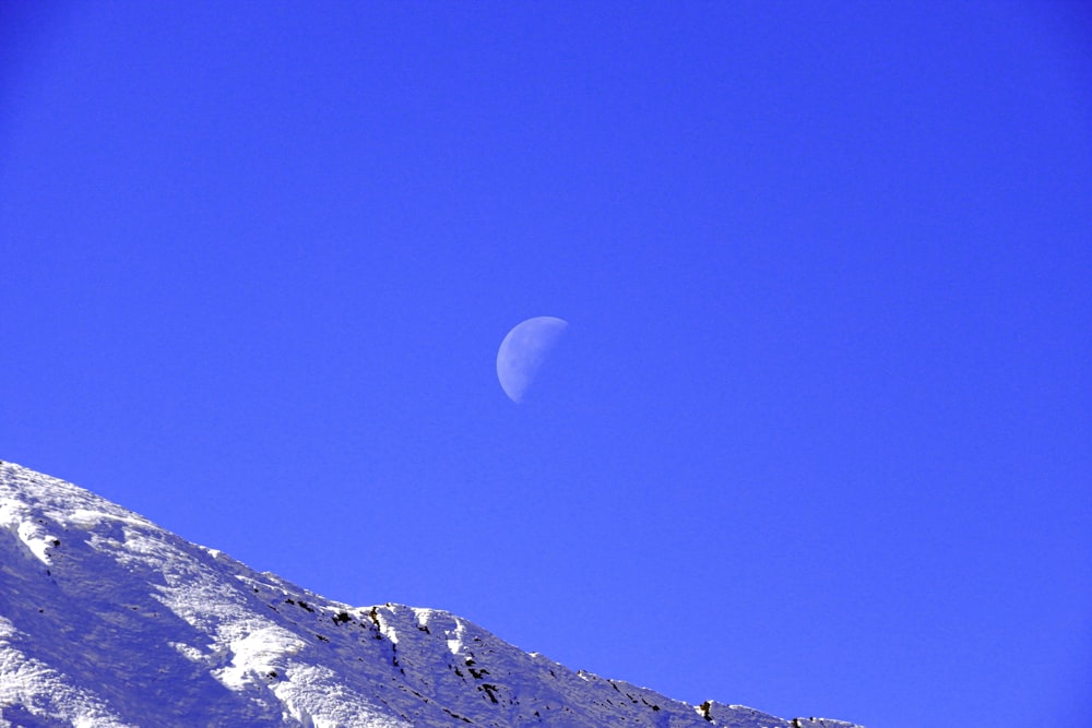 white and black mountain under blue sky during daytime