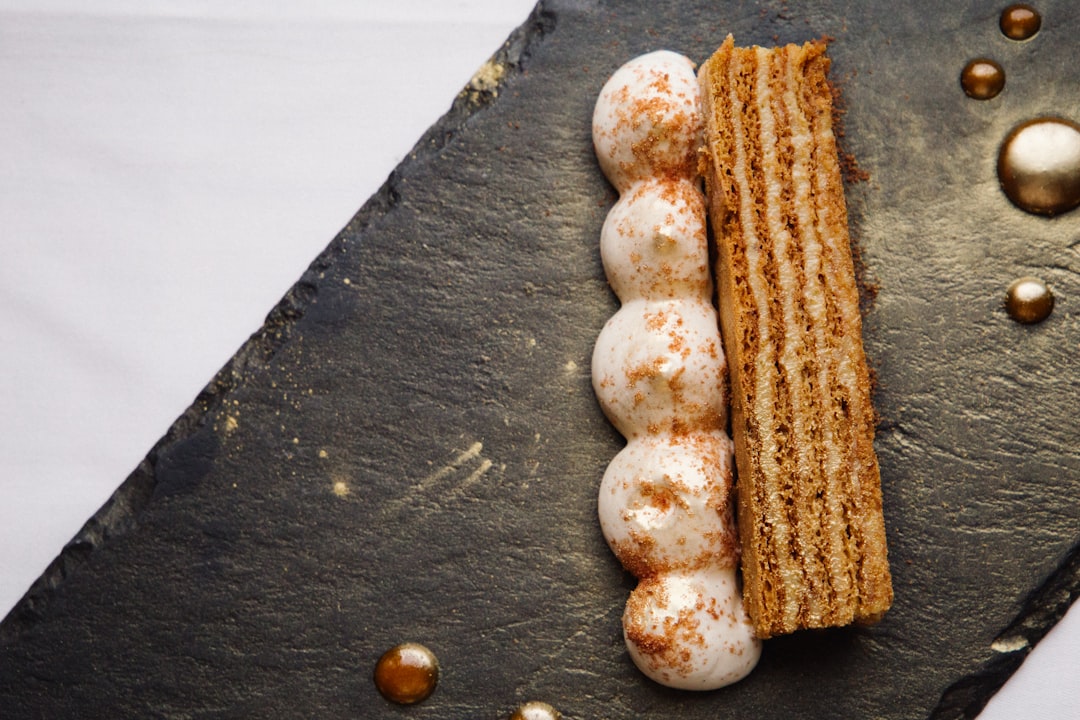 brown and white bread on black wooden table