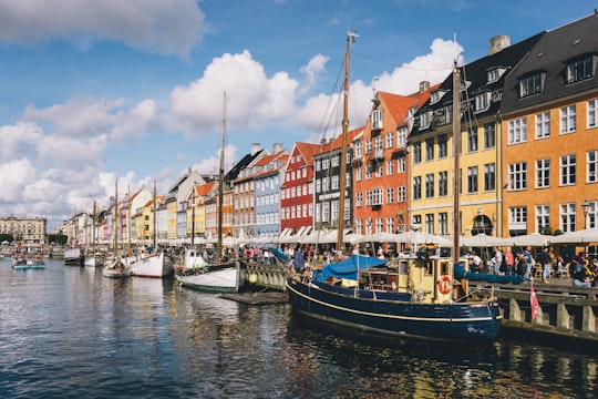 boat on dock near buildings during daytime in Mindeankeret Denmark