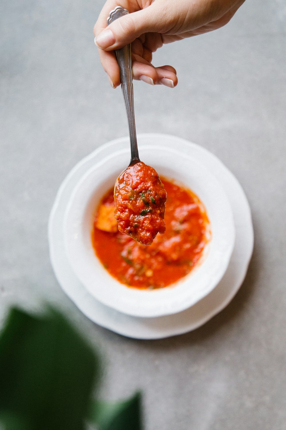 red sauce on white ceramic bowl