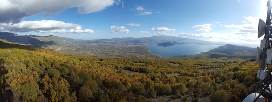 green and brown grass field under blue sky during daytime in Άγιος Αθανάσιος Greece