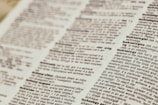 A close-up view of a dictionary page focusing on words related to 'technology.' The text is clear, with bold headings for each term and line-by-line definitions.