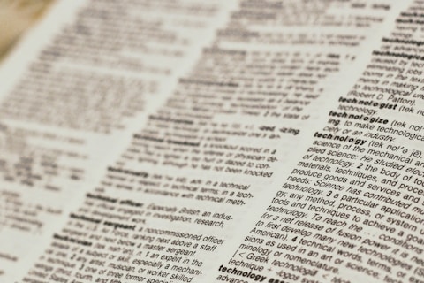 A close-up view of a dictionary page focusing on words related to 'technology.' The text is clear, with bold headings for each term and line-by-line definitions.
