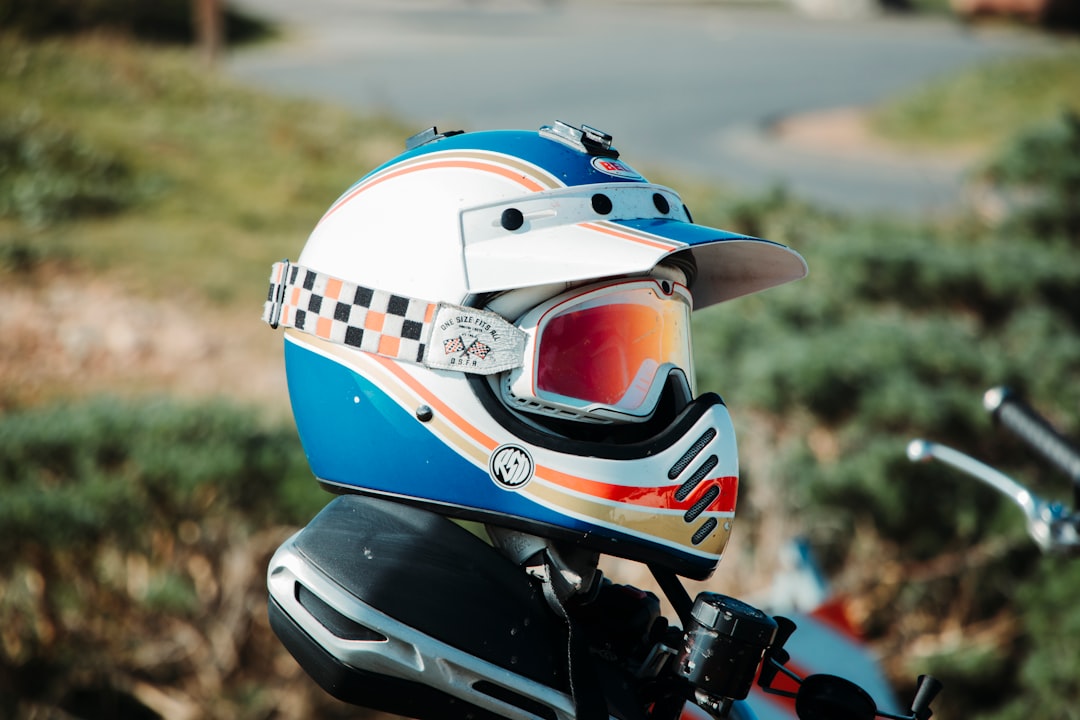 white blue and red motorcycle helmet