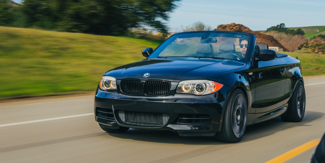 blue bmw m 3 on road during daytime